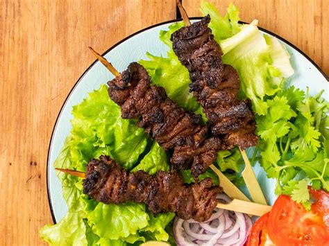  Spicy Suya Skewers: Tender Grilled Meat Infused With Smoky Flavors and Aromatic Spices!